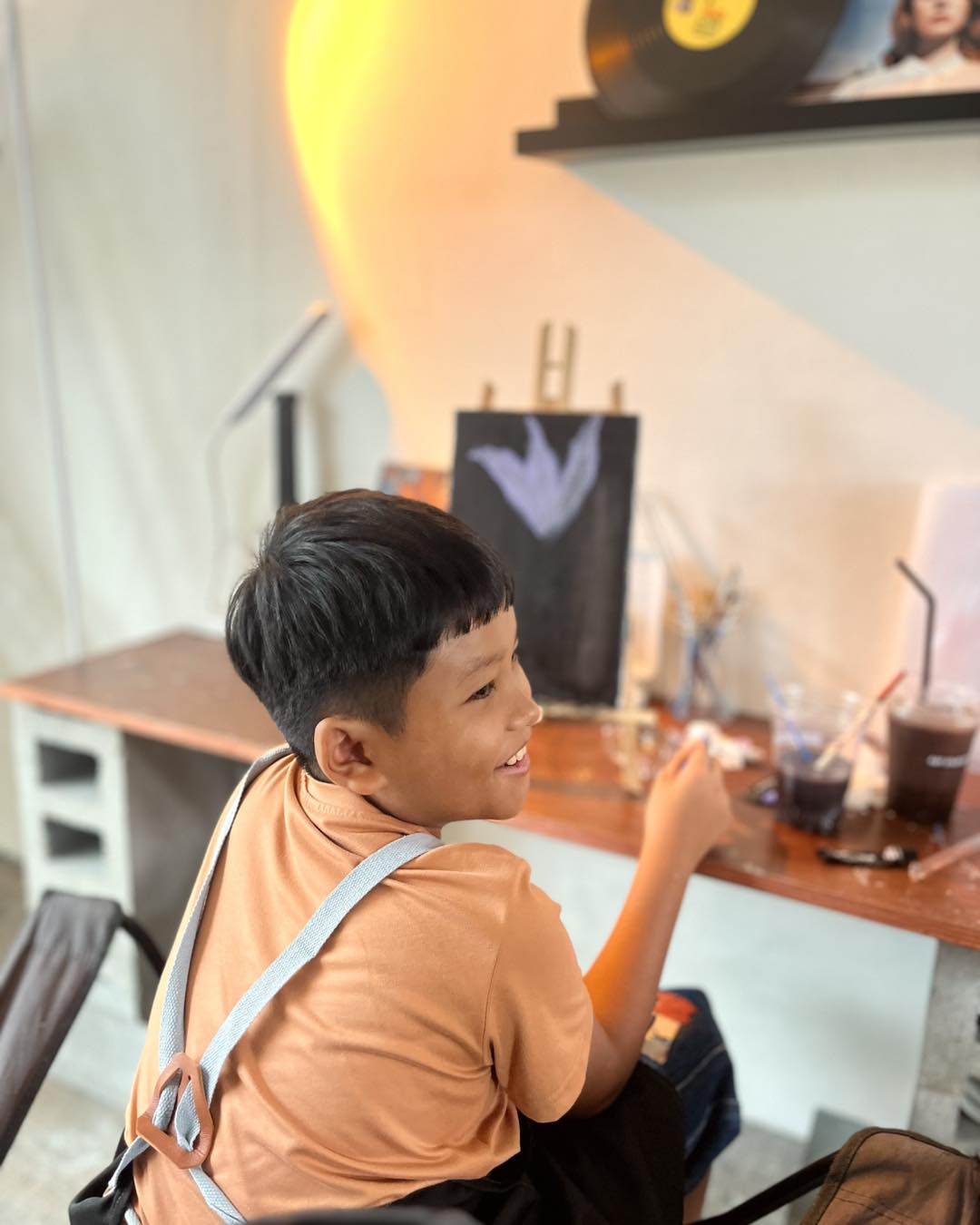 A guest painting in the studio
